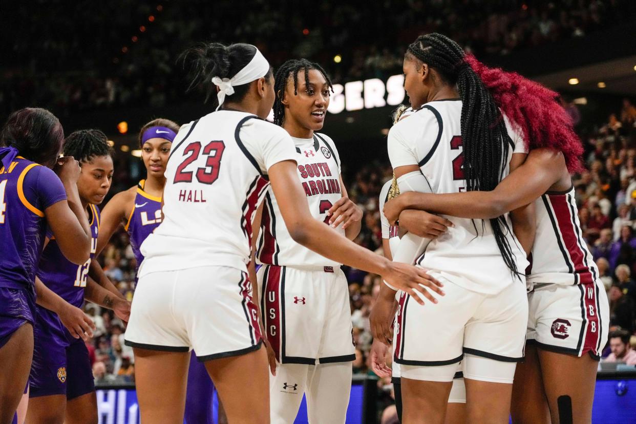 South Carolina players huddle late during the second half of the SEC championship game against LSU at Bon Secours Wellness Arena in Greenville, S.C. on March 10, 2024.
