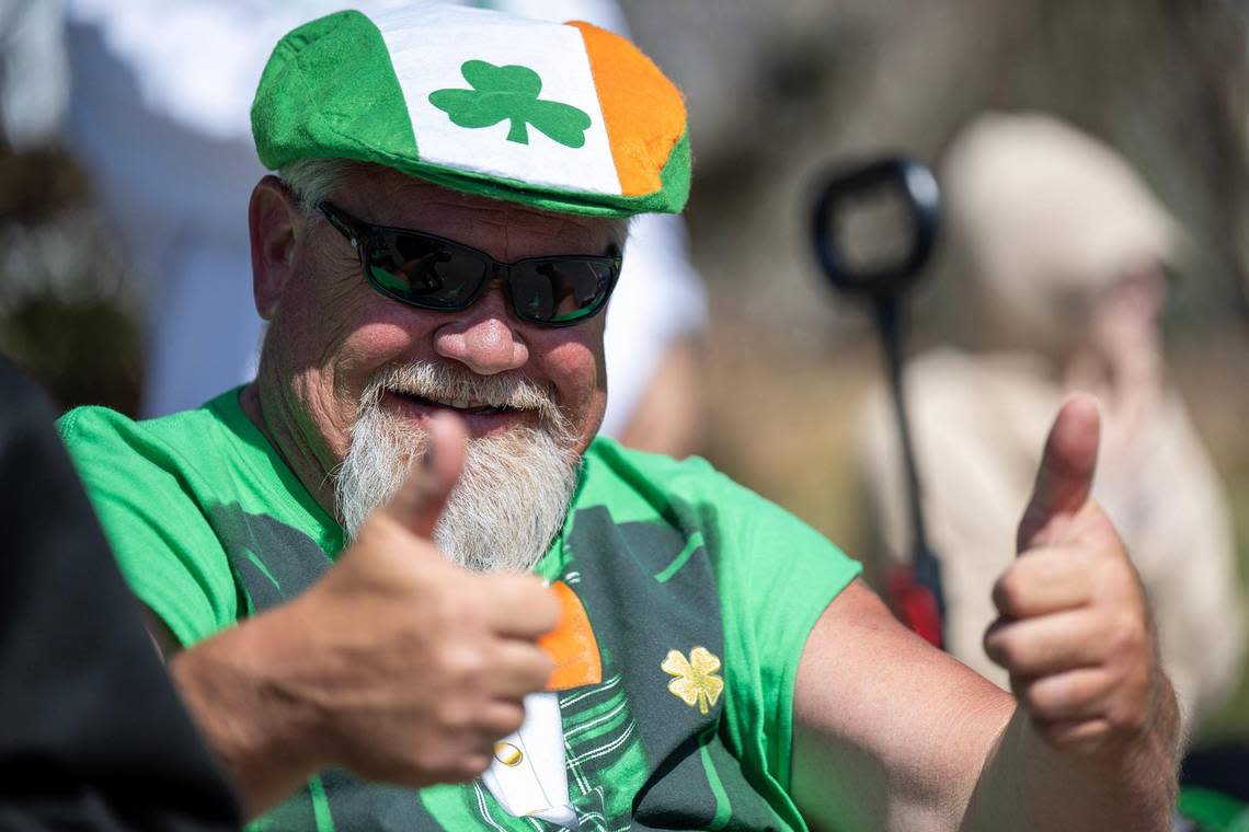 Todd Griswold of Overland Park sat along Johnson Drive and watched the annual Shawnee St. Patrick’s Day Parade on Sunday, March 10, 2024, in Shawnee.