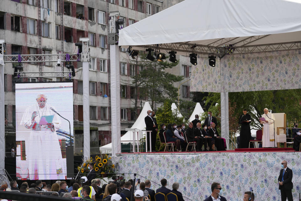 Pope Francis meets members of the Roma community at Lunik IX, in Kosice, Slovakia, Tuesday, Sept. 14, 2021, the biggest of about 600 shabby, segregated settlements where the poorest 20% of Slovakia's 400,000 Roma live. Pope Francis traveled to Kosice, in the far east of Slovakia on Tuesday to meet with the country's Roma in a gesture of inclusion for the most socially excluded minority group in Slovakia, who have long suffered discrimination, marginalization and poverty. (AP Photo/Petr David Josek)