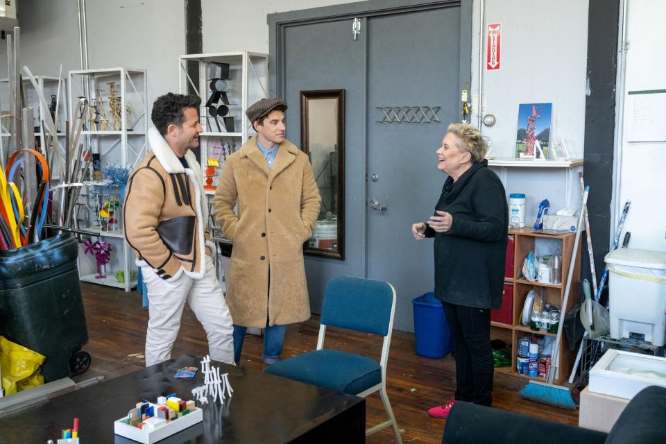 Nate Berkus and Jeremiah Brent with Cornwall artist and owner of a local art studio, Vivien Collens. Berkus and Brent were in Cornwall as part of the new HGTV series "Home Town Kickstart presented by People."