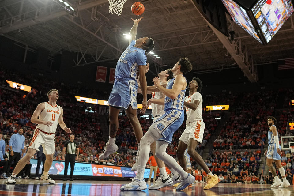 North Carolina forward Armando Bacot (5) shoots against Clemson during the second half of an NCAA college basketball game, Saturday, Jan. 6, 2024, in Clemson, S.C. AP Photo/Mike Stewart)