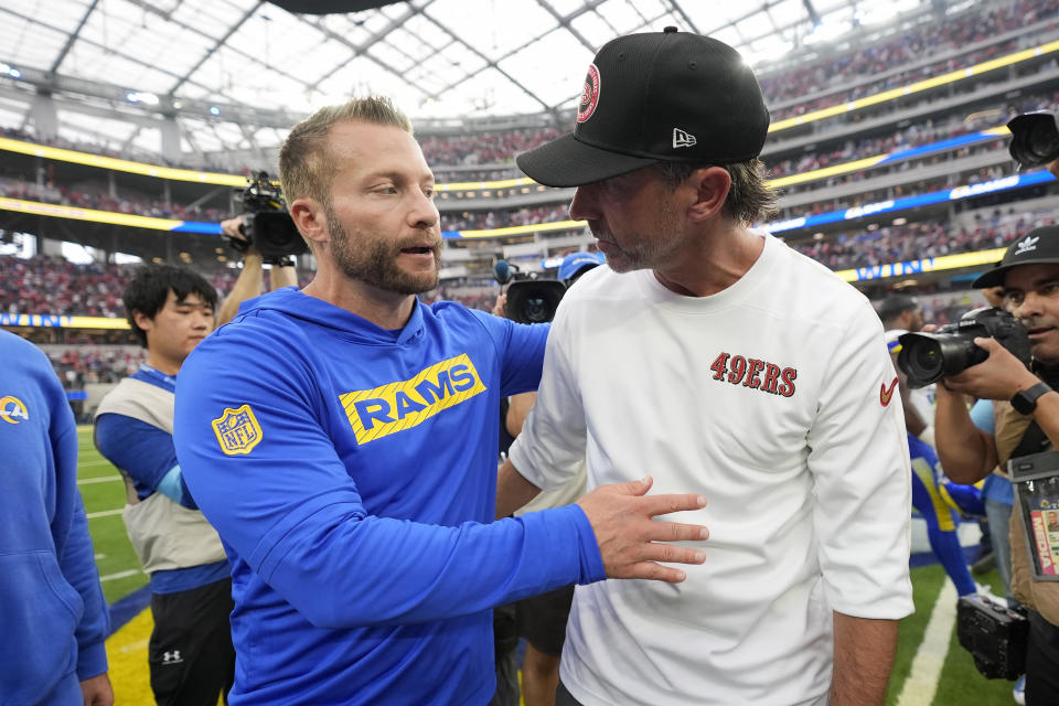 Los Angeles Rams head coach Sean McVay, left, greets San Francisco 49ers head coach Kyle Shanahan after an NFL football game, Sunday, Sept. 22, 2024, in Inglewood, Calif. (AP Photo/Ashley Landis)