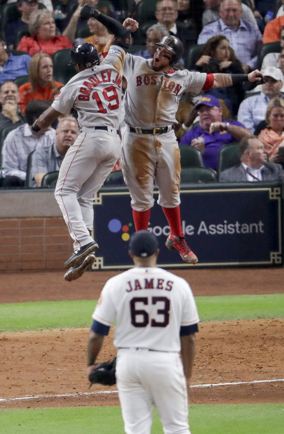 Boston Red Sox's Jackie Bradley Jr., celebrates after his two-run home run with Christian Vazquez off Houston Astros starting pitcher Josh James during the sixth inning in Game 4 of a baseball American League Championship Series on Wednesday, Oct. 17, 2018, in Houston. (AP Photo/Lynne Sladky)