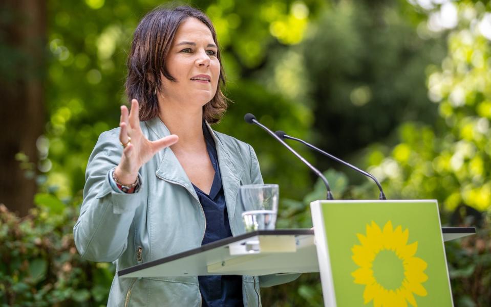 Mandatory Credit: Photo by ANDREAS GORA/POOL/EPA-EFE/Shutterstock (12245436i) Annalena Baerbock, chairwoman and candidate for chancellor of The Greens (Gruene) political party, at the presentation of the immediate climate program, in Biesenthal am Hellsee, Germany, 03 August 2021. Germany: Presentation of the immediate climate program of the Green Party, Biesenthal Am Hellsee - 03 Aug 2021 - ANDREAS GORA/POOL/EPA-EFE/Shutterstock/Shutterstock