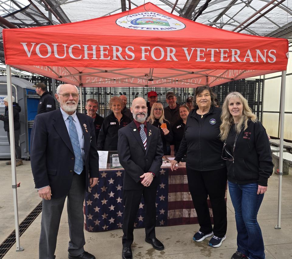 From left to right front row: Norman Gervais, PER, Lodge Secretary, ENF Chair, Rochester Elks; Peter Ducharme, Rochester Elks Exalted Ruler; Jeanne Grover, President, Vouchers for Veterans; Kelly O’Neil, Executive Assistant for Vouchers for Veterans. Second row: Vouchers for Veterans Volunteers, Alan Brock, Dale Labrecque, Ann French and Danielle Reddington. Third row: Veterans: Steve Merchant, James Frost, Dave Hau, Michael Weaver and Michelle King.