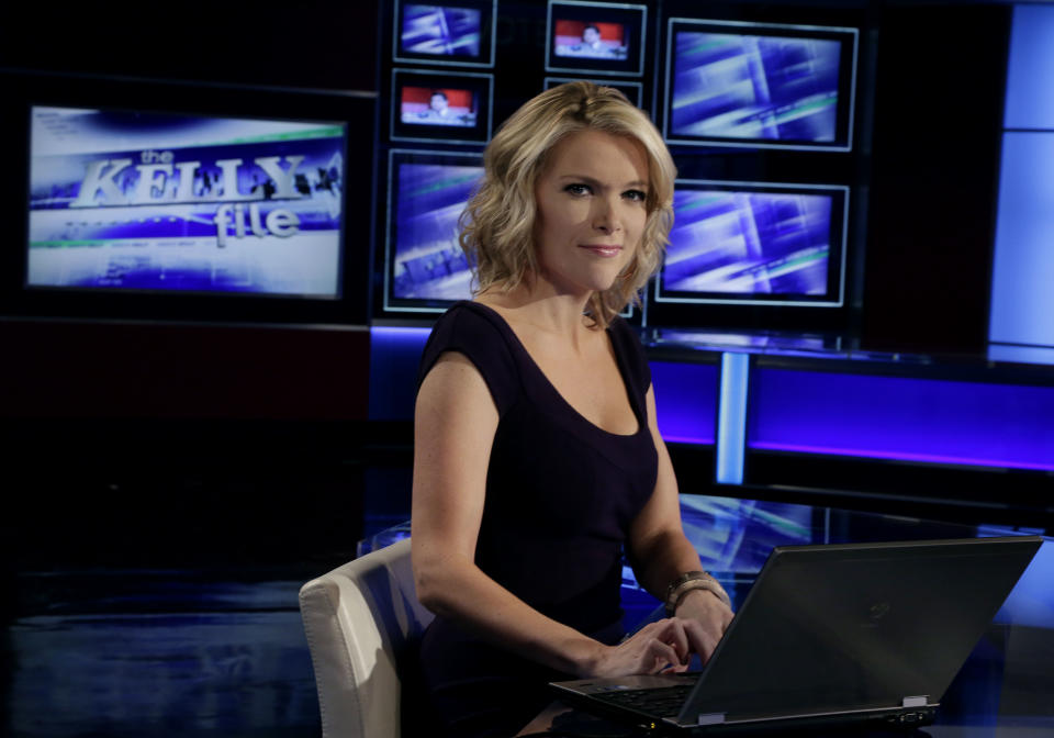 Megyn Kelly, host of Fox News Channel's "The Kelly Files," poses for a photo as she rehearses for the debut of her new prime-time show, in New York, Friday, Oct. 4, 2013. Her program is the linchpin to the first overhaul of Fox's prime-time lineup since 2002, or about a century in television time. (AP Photo/Richard Drew)