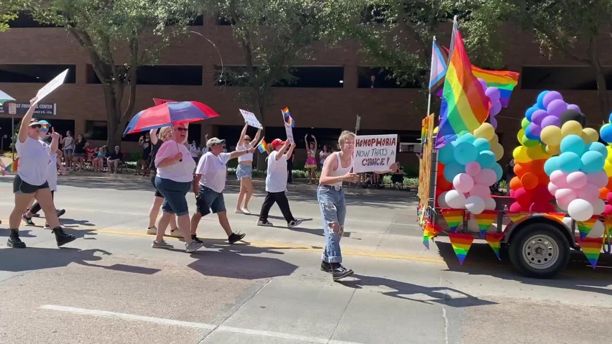 Interaction between those in Pride Parade and those protesting it