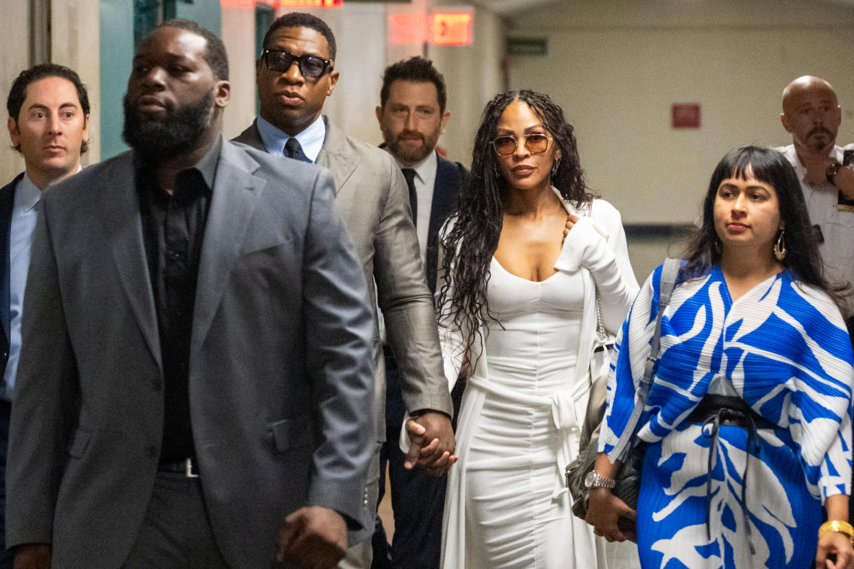 NEW YORK, NEW YORK - AUGUST 03: Actor Jonathan Majors, and his girlfriend, Megan Good, flanked by his lawyer Priya Chaudhry (R), arrive to Manhattan Criminal Court for his pre-trial hearing on August 03, 2023 in New York City. If convicted, Majors could face up to a year in jail over misdemeanor charges of assault and harassment. (Photo by Alexi Rosenfeld/Getty Images)