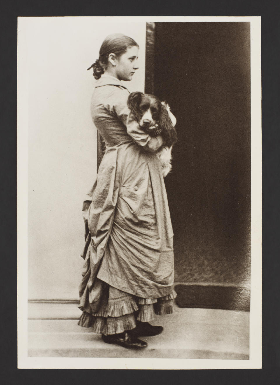 Print on paper of Beatrix Potter, aged 15, with her dog, Spot, by Rupert Potter c1880–1 (Vi&A courtesy Frederick Warne & Co Ltd/PA)