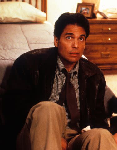 <p>United Artists/Getty </p> Chris Sarandon as Detective Mike Norris in <em>Child's Play</em> (1988)