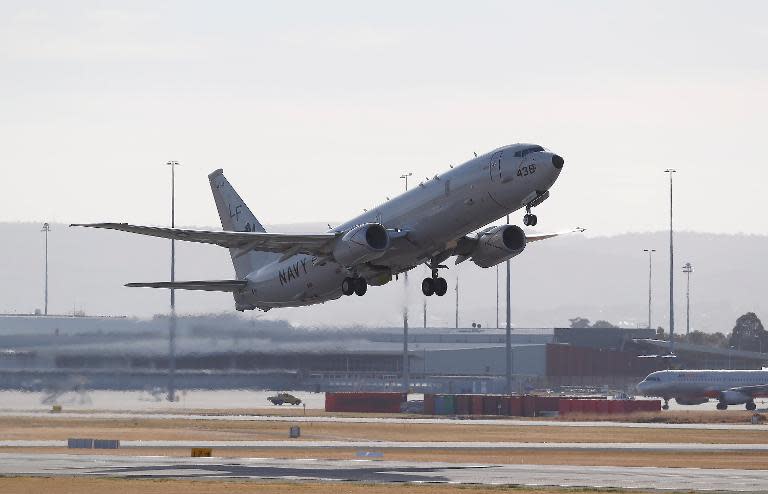 A US Navy P8 Poseidon takes off from Perth International Airport as part on the ongoing search operation for missing Malaysia Airlines flight MH370, on April 17, 2014