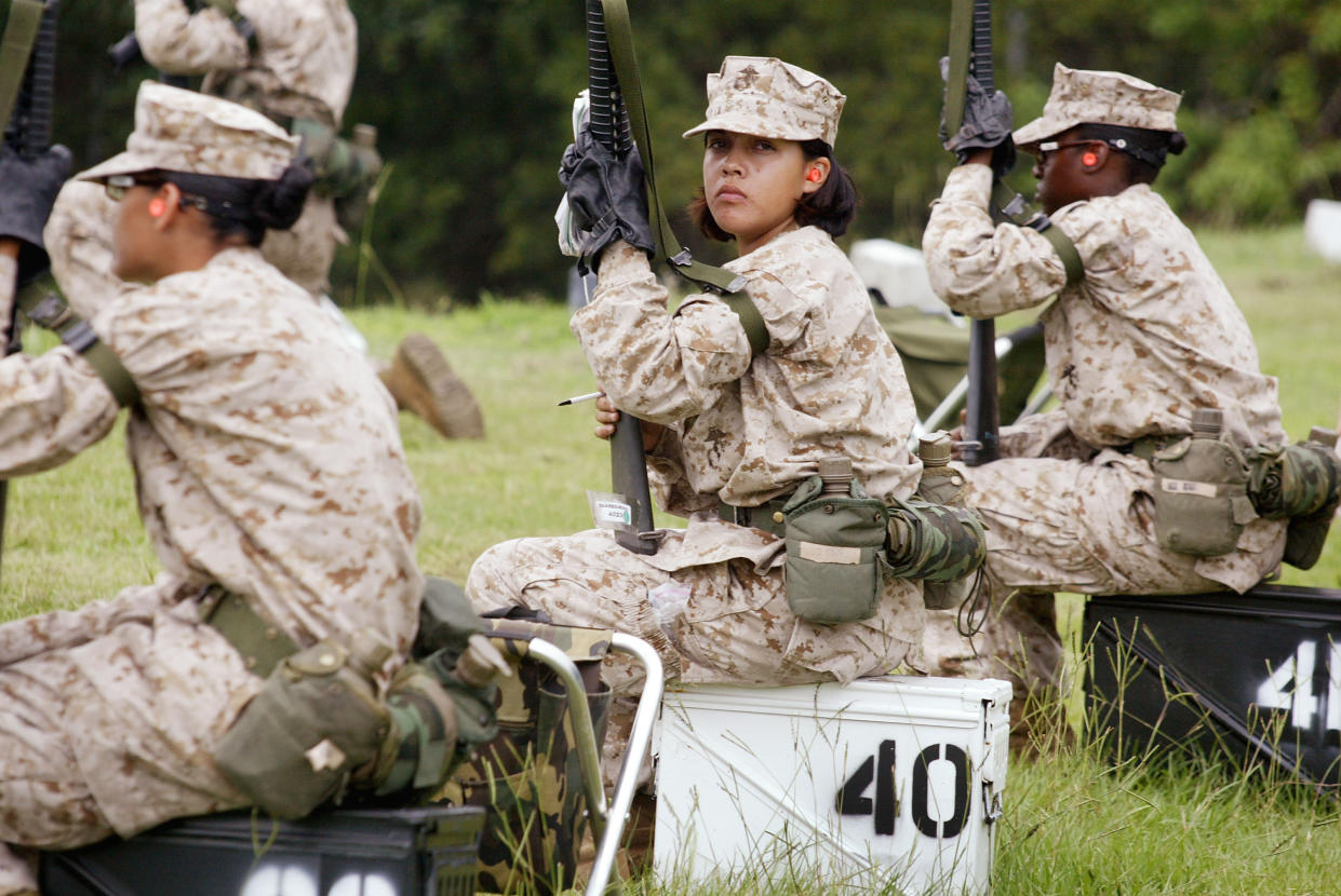 Female Marine Corps recruits drill on the rifle range at the Marine Corps recruit depot on Parris Island, S.C., on June 21, 2004. (Photo: Scott Olson/Getty Images)