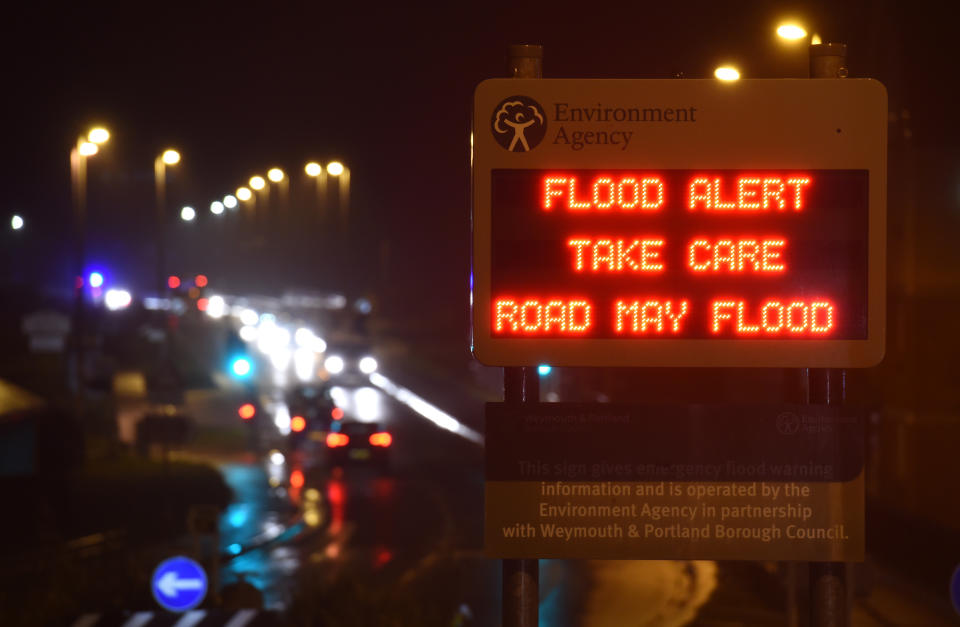 WEYMOUTH, UNITED KINGDOM - JANUARY 13: Environment Agency flood alert warning sign on the A354 road as Storm Brendan heads in on January 13, 2020 in Weymouth, United Kingdom. (Photo by Finnbarr Webster/Getty Images)