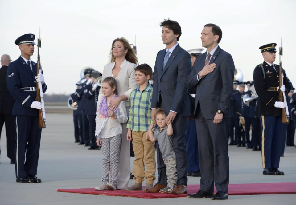 Prime Minister Justin Trudeau arrives for a state visit in Washington, D.C., with his wife Sophie Gregoire-Trudeau and their children Xavier James, Ella-Grace and Hadrian and Peter A. Selfridge, right, United States Chief of Protocol on Wednesday, March 9, 2016. THE CANADIAN PRESS/Paul Chiasson