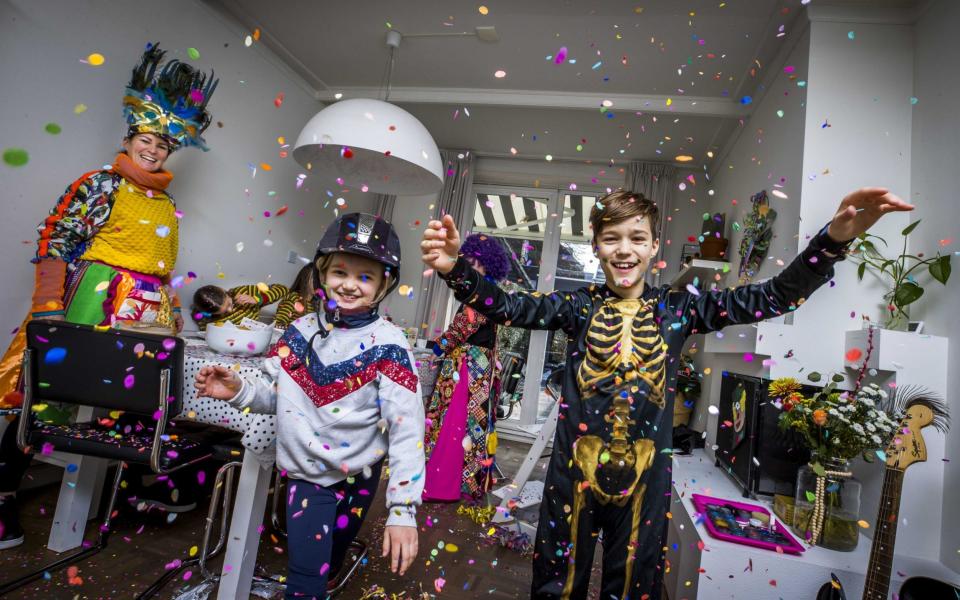 Family members celebrate their own carnival party at home due to coronavirus control measures - Marcel Van Hoorn/EPA-EFE/Shutterstock 