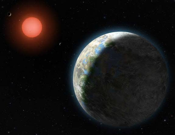 This artist's conception shows the inner four planets of the Gliese 581 system and their host star. The large planet in the foreground is Gliese 581g, which is in the middle of the star's habitable zone and is only two to three times as massive