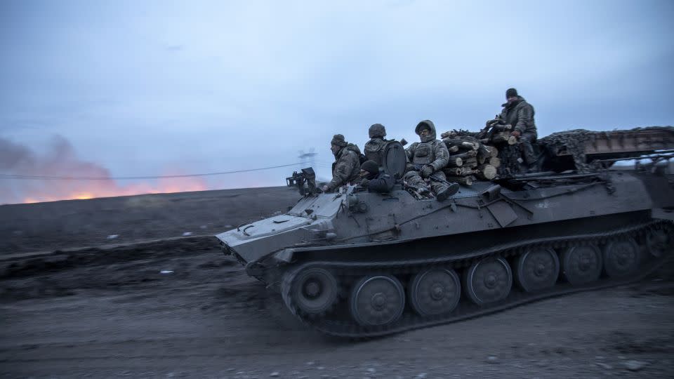 Ukrainian servicemen on an armored carrier return from the Semenivka battlefield near Avdiivka on March 4. - Narciso Contreras/Anadolu via Getty Images