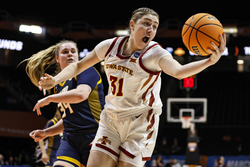 Iowa State forward Morgan Kane (31) grabs a rebound in front of Toledo forward Jessica Cook (34) in the second half of a first-round college basketball game in the NCAA Tournament, Saturday, March 18, 2023, in Knoxville, Tenn. (AP Photo/Wade Payne)