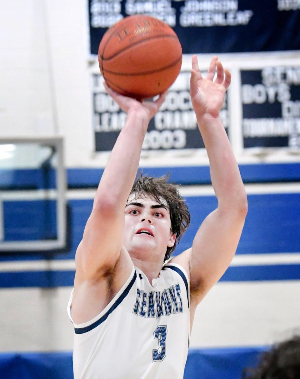 Cape Cod Academy's Jaeden Greenleaf puts up a three-pointer that broke Kendall Currence's record of 2,310 pojnts during their game against Carver in the MIAA Div. 4 round of 32 basketball game March 4.