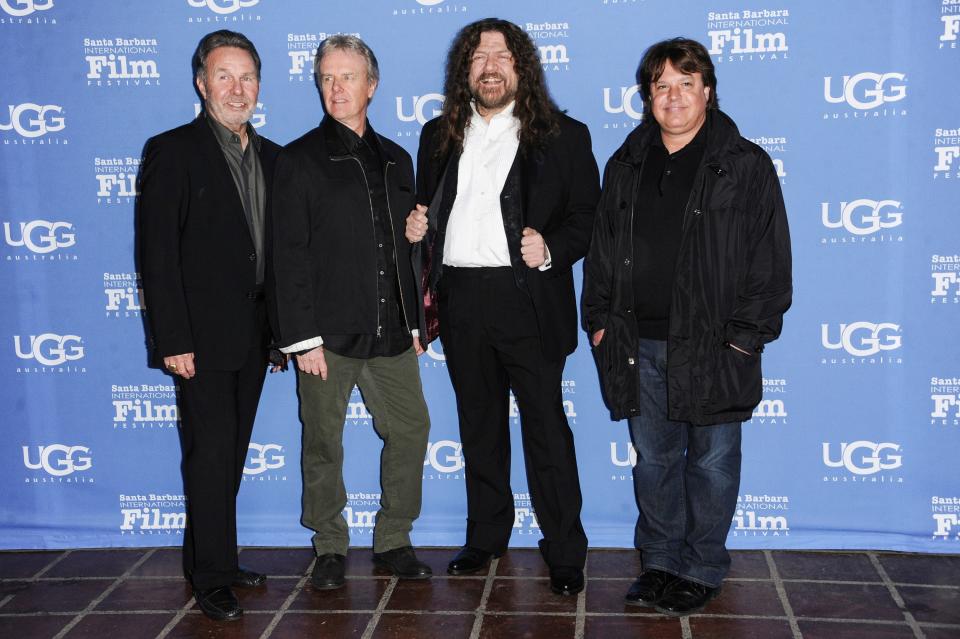 Manager Budd Carr, from left, drummer Phil Ehart and vocalist and violinist Robert E. “Robby” Steinhardt, of Kansas, with director Charley Randazzo arrive at the 30th Santa Barbara International Film Festival Montecito Award ceremony on Jan. 30, 2015, in Santa Barbara, Calif.