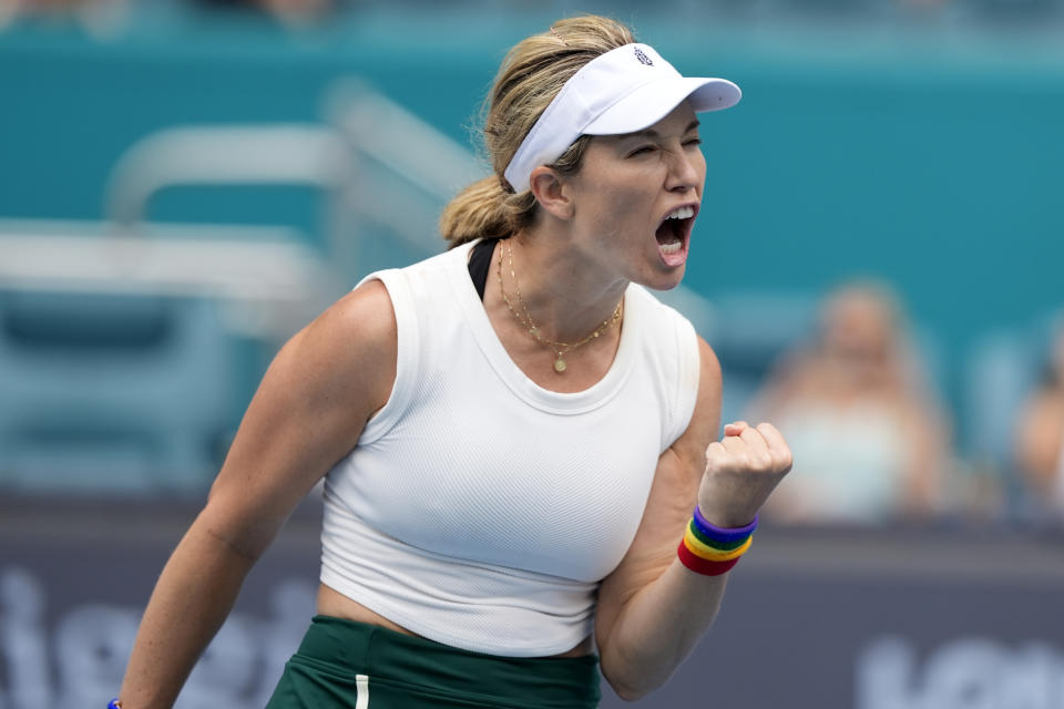 Danielle Collins reacts after winning a point against Caroline Garcia, of France, during the Miami Open tennis tournament, Wednesday, March 27, 2024, in Miami Gardens, Fla. (AP Photo/Lynne Sladky)