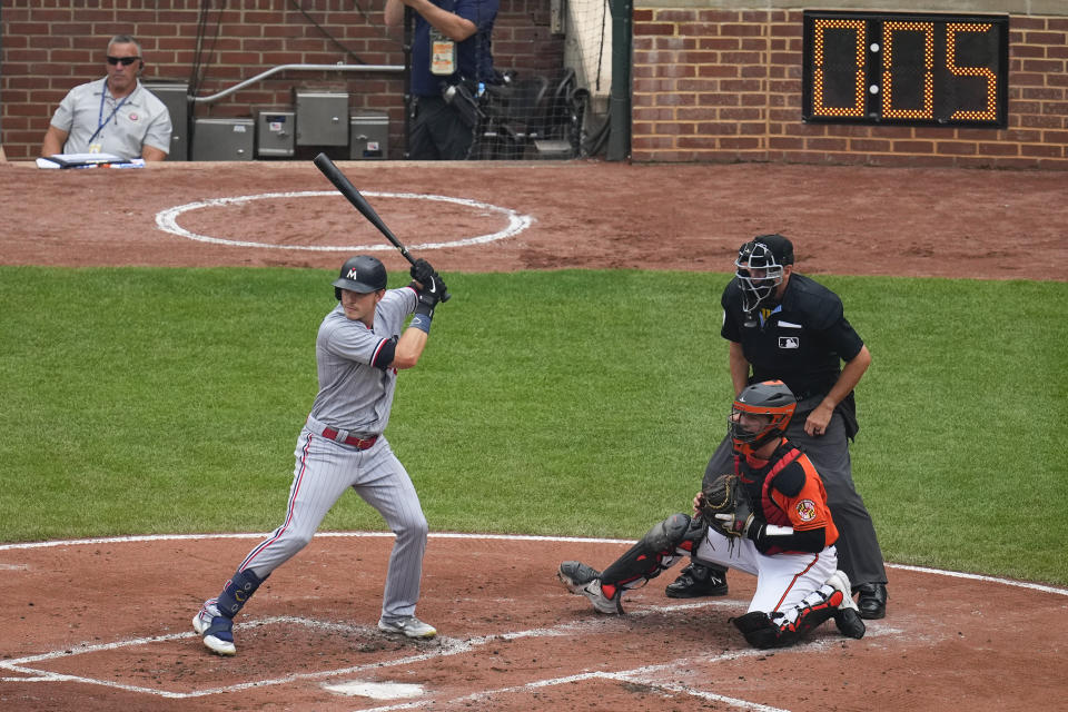 The pitch clock is seen as Minnesota Twins' Max Kepler takes an at-bat during the second inning of a baseball game against the Baltimore Orioles, Saturday, July 1, 2023, in Baltimore. (AP Photo/Julio Cortez)