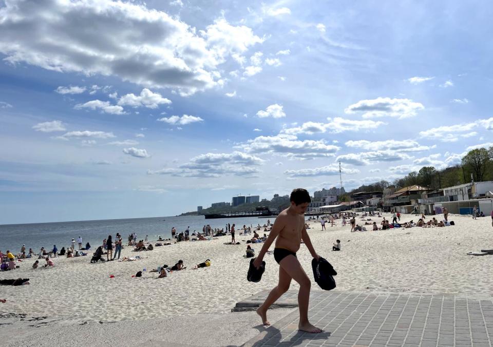 Sunbathers flock to an Odesa city beach.