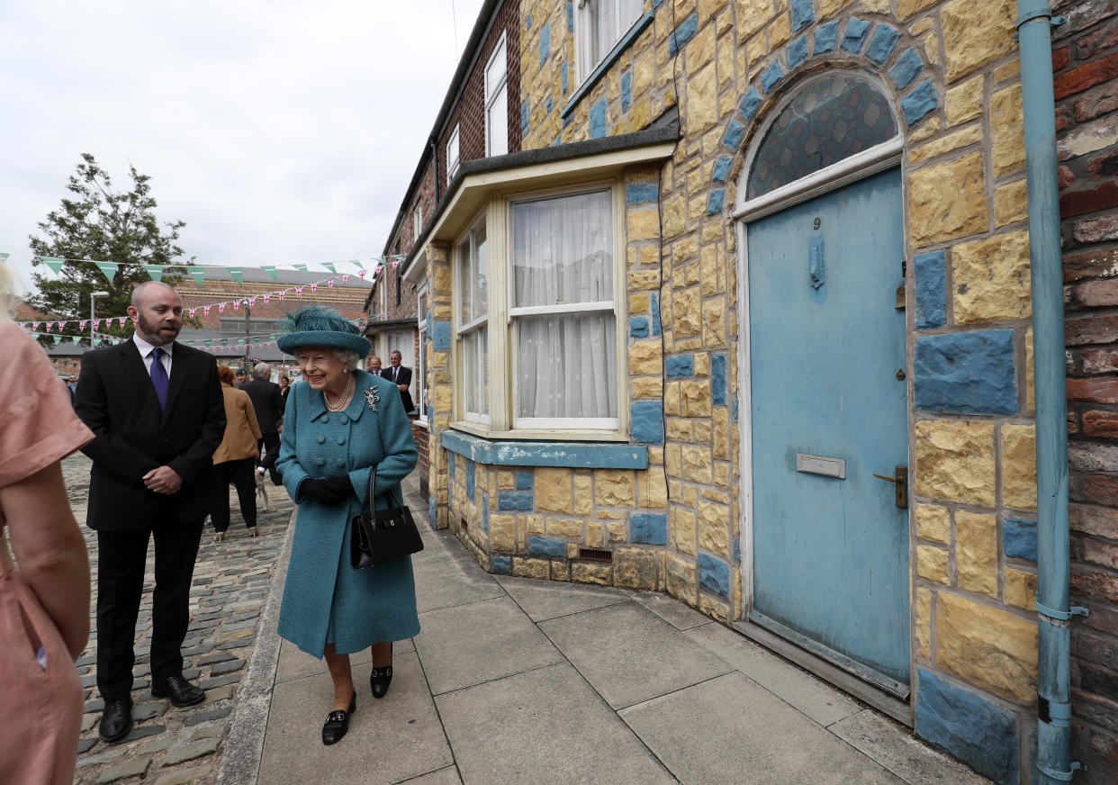 Queen Elizabeth II during a visit to the set of Coronation Street at the ITV Studios, Media City UK, Manchester. Picture date: Thursday July 8, 2021.