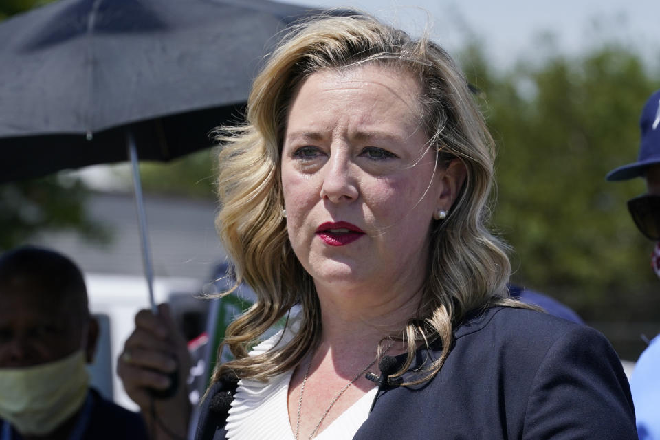 FILE - In this Tuesday, Aug. 18, 2020, file photo, U.S. Rep. Kendra Horn, D-Okla., speaks during a news conference in front of a post office in Oklahoma City. Horn pulled off one of the biggest political upsets in 2018 when she ousted a two-term Republican incumbent. But Horn won't have the element of surprise in this year's contest against Republican state Sen. Stephanie Bice. (AP Photo/Sue Ogrocki, File)