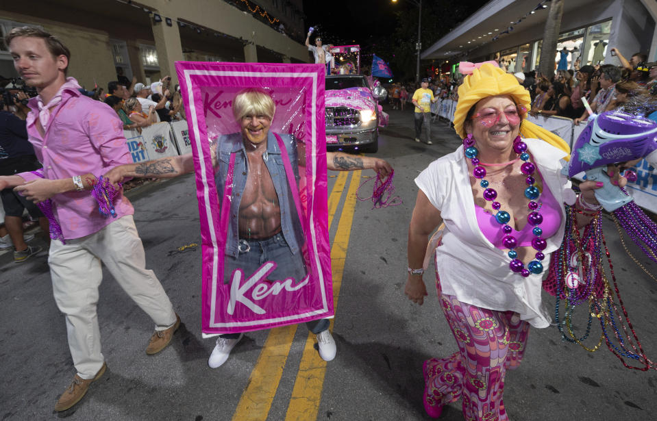 In this Saturday, Oct. 28, 2023, photo provided by the Florida Keys News Bureau, a man costumed as a Ken doll from the blockbuster film "Barbie" marches in the Fantasy Fest Parade in Key West, Fla. The procession of floats and colorfully garbed walking groups highlighted the 10-day Fantasy Fest costuming and masking festival that ends Sunday, Oct. 29. (Andy Newman/Florida Keys News Bureau via AP)
