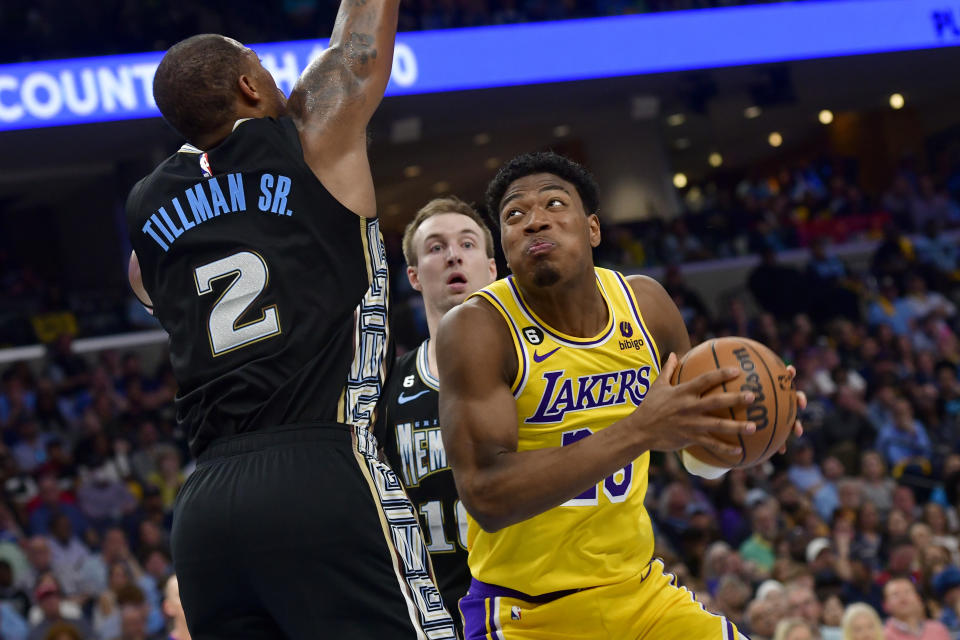 Los Angeles Lakers forward Rui Hachimura looks to shoot against Memphis Grizzlies forward Xavier Tillman (2) during the second half of Game 2 in a first-round NBA basketball playoff series Wednesday, April 19, 2023, in Memphis, Tenn. (AP Photo/Brandon Dill)