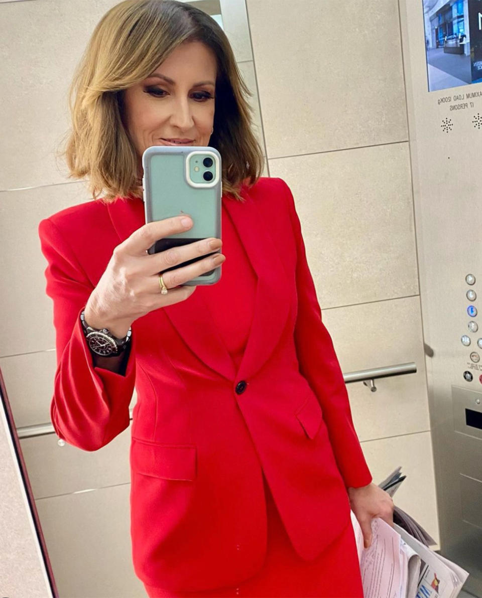 Natalie Barr in a red Zara suit