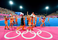 Team Netherlands celebrate their 2-0 victory over team Argentina after the Women's Hockey gold medal match on Day 14 of the London 2012 Olympic Games at Hockey Centre on August 10, 2012 in London, England. (Getty Images)