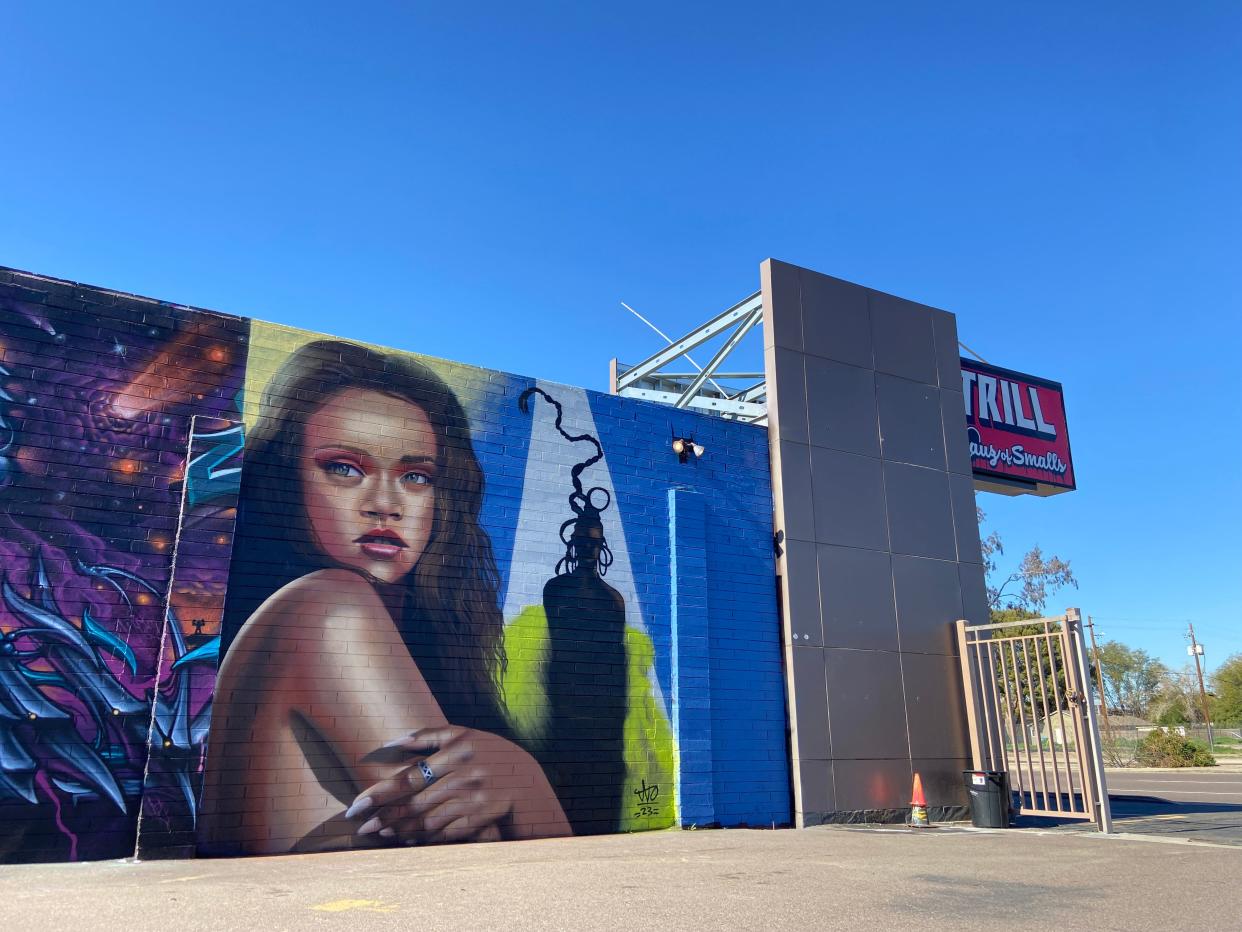 Tato Caraveo painted Rihanna on the exterior of Trill on Jan. 21-22, 2023, ahead of her Super Bowl Halftime Show performance.