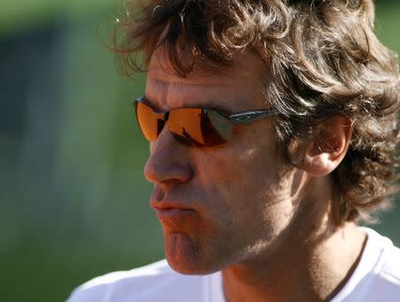 Mats Wilander, captain of the Sweden Davis Cup team, watches his team train ahead of their quarter-final match against Argentina in Buenos Aires April 8, 2008. REUTERS/Enrique Marcarian