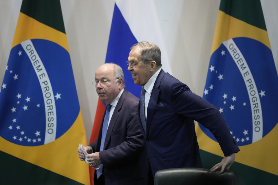 Russia's Foreign Minister Sergei Lavrov, right, and Brazil's Foreign Minister Mauro Vieira arrive to give a joint statement at Itamaraty Palace in Brasilia, Brazil, Monday, April 17, 2023. (AP Photo/Eraldo Peres)