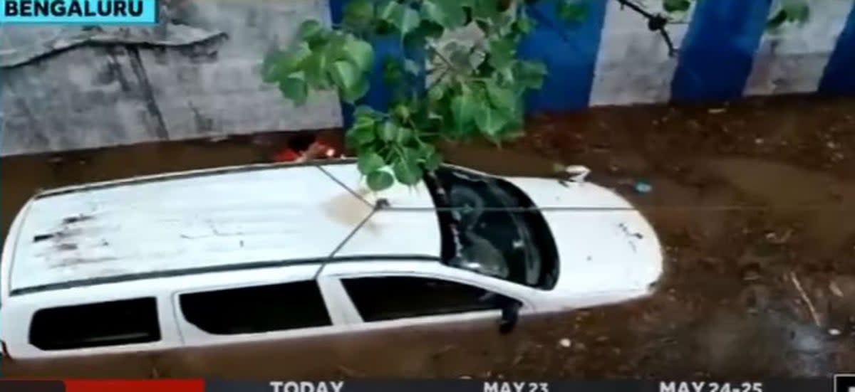 A techie in Bengaluru, India, died after her car got stuck in neck-deep water (Screengrab/ Times of India)