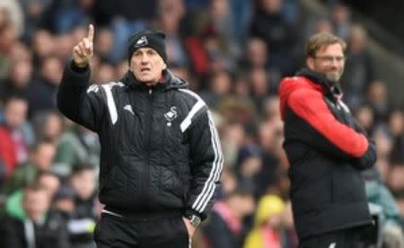 Britain Football Soccer - Swansea City v Liverpool - Barclays Premier League - Liberty Stadium - 1/5/16 Liverpool manager Juergen Klopp and Swansea manager Francesco Guidolin Reuters / Rebecca Naden Livepic
