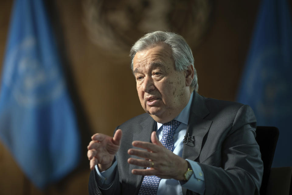 FILE - United Nations Secretary-General Antonio Guterres speaks during interview at the United Nations headquarters, Jan. 20, 2022, in New York. The head of the United Nations announced the appointment Thursday, March 31, 2022, of an expert panel led by Canada's former environment minister Catherine McKenna to scrutinize whether companies' efforts to curb climate change are credible or mere ‘greenwashing.’ (AP Photo/Robert Bumsted, File)