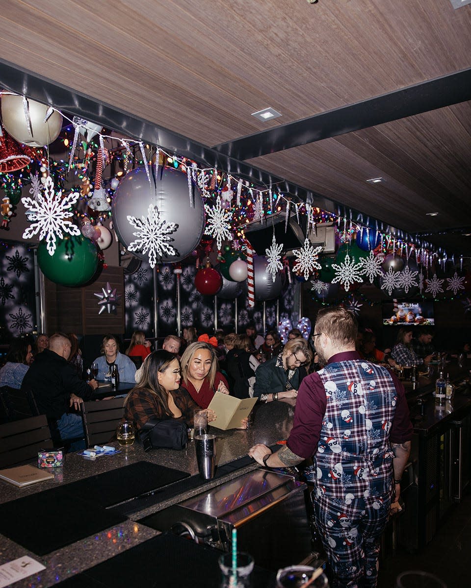 Visit Rudolph's Rooftop, a holiday-themed pop-up bar at The Republic on Grand in Des Moines.