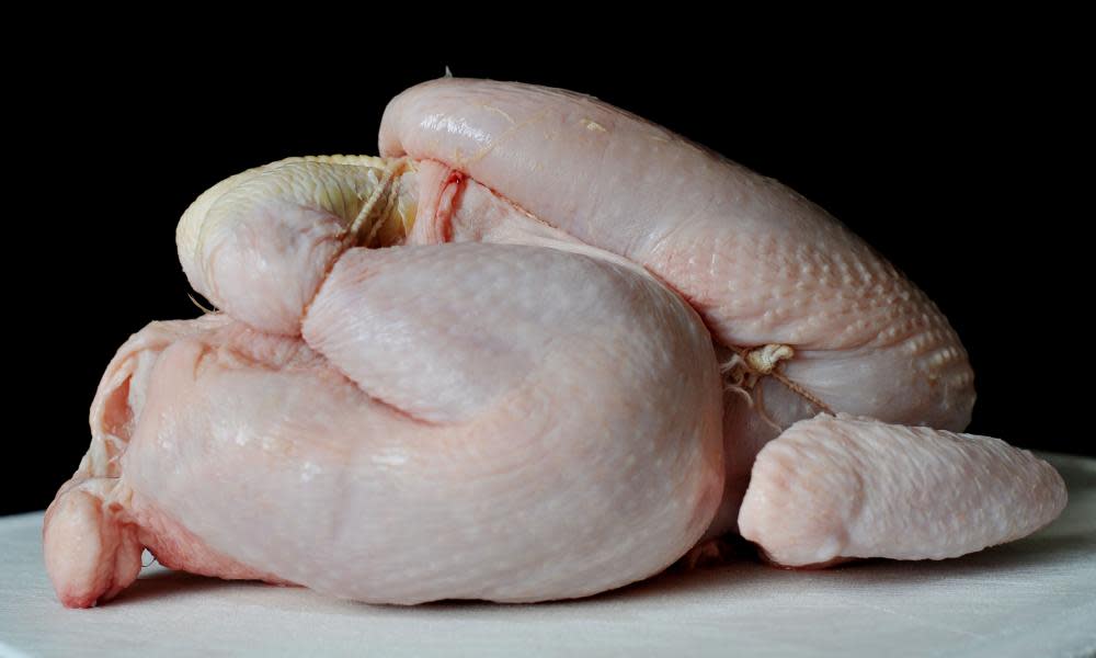 Raw chicken on a chopping board