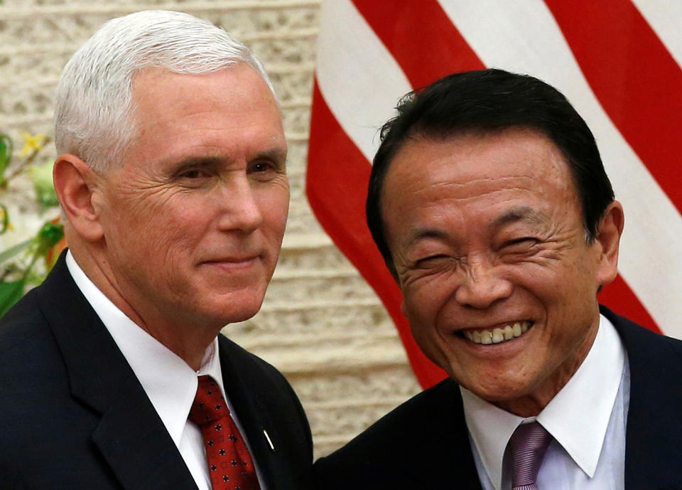 Mike Pence and Taro Aso attend their joint news conference in Tokyo