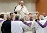 Pope Francis waves as he leaves after a Holy Mass in Carpi, Italy, April 2, 2017. REUTERS/Alessandro Garofalo