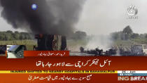 <p>In this image taken from video, black smoke rises from oil tanker on road in Bahawalpur, Pakistan, Sunday, June 25, 2017. An overturned oil tanker burst into flames in Pakistan on Sunday, killing people who had rushed to the scene of the highway accident to gather leaking fuel, an official said. (AAJ News via AP Video) </p>