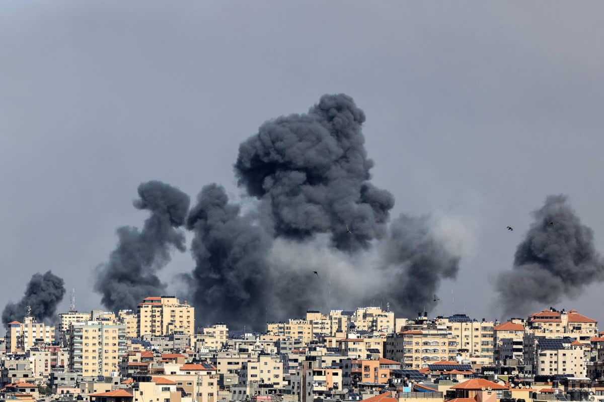 Smoke rises over Gaza City on October 7, 2023 during Israeli air strike (AFP via Getty Images)