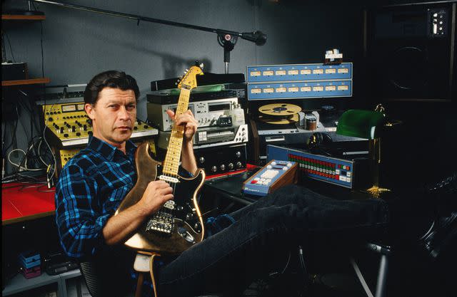 <p>George Rose/Getty</p> Robbie Robertson in his recording studio during a 1987 Santa Monica