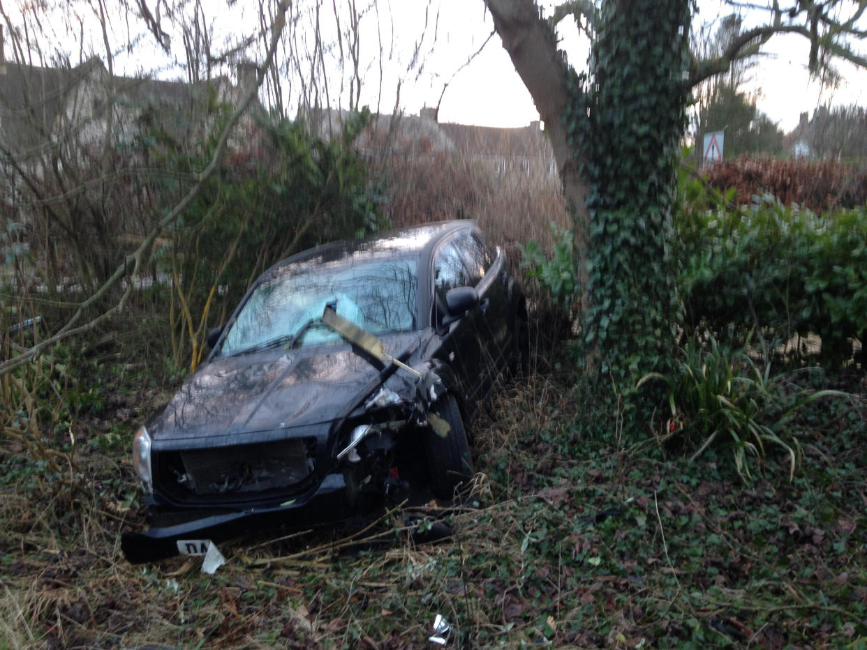 A car which crashed into the Robinsons garden in 2018. (SWNS)