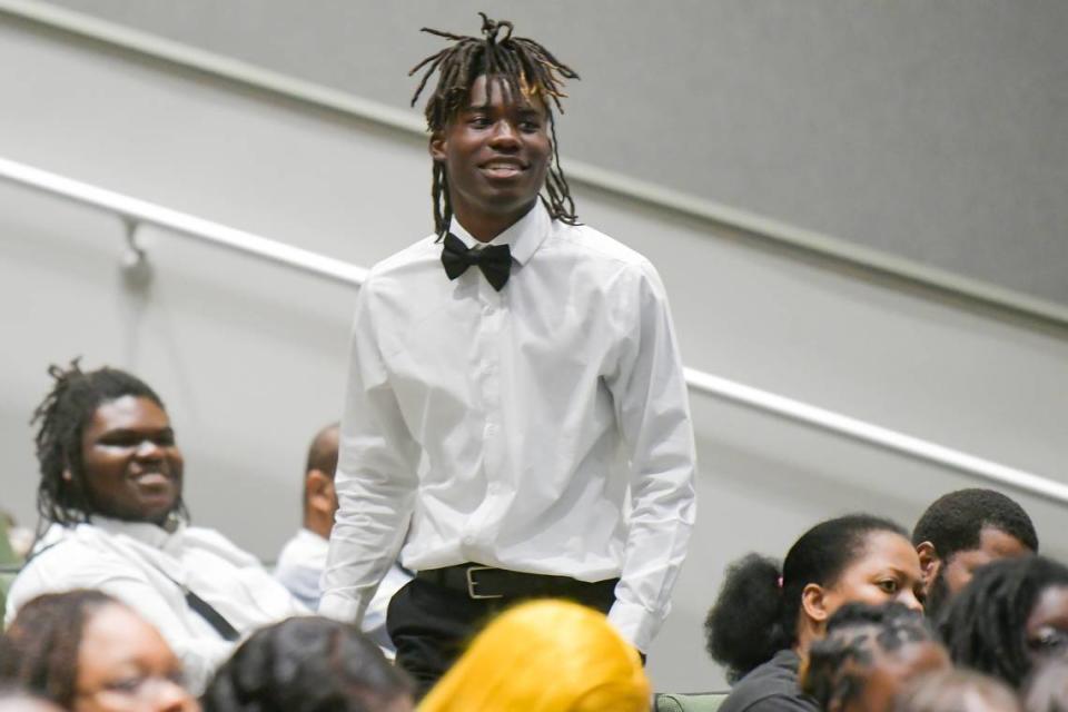 Spencer High School senior Dray Duncan reacts after he was announced as one of the Charleen Brown Robinson Scholarship recipients during the senior class awards ceremony May 8, 2024, in the Spencer auditorium.