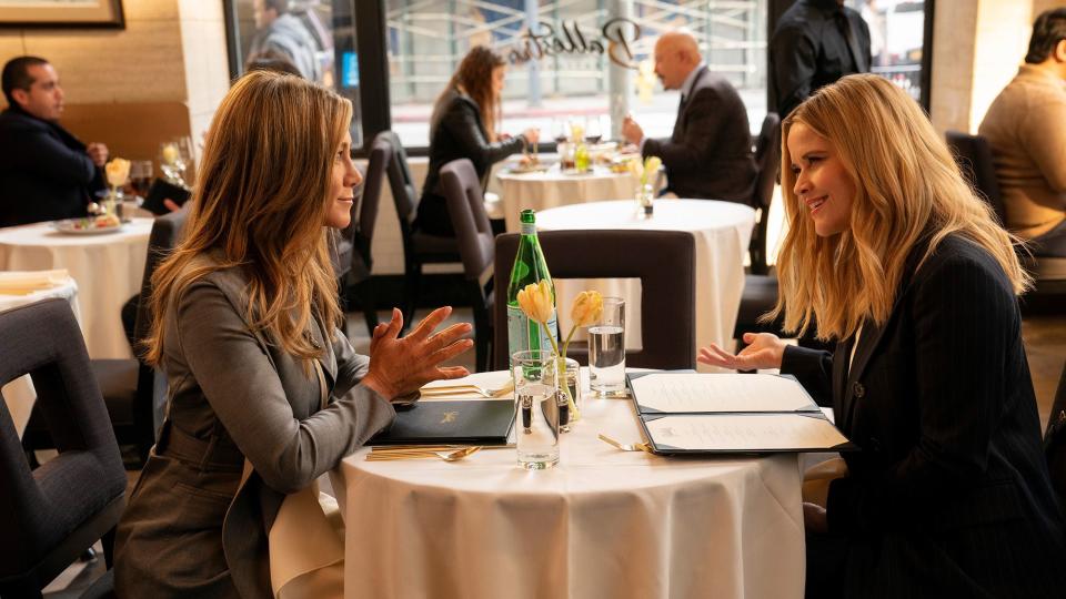 Jennifer Aniston and Reese Witherspoon in “The Morning Show” season two, premiering September 17, 2021 on Apple TV+.