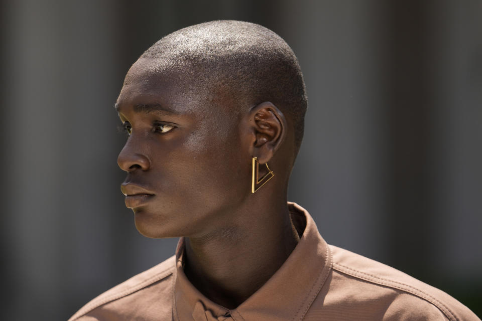 A model wears a creation as part of the Valentino men's Spring Summer 2024 collection presented in Milan, Italy, Friday, June 16, 2023. (AP Photo/Luca Bruno)